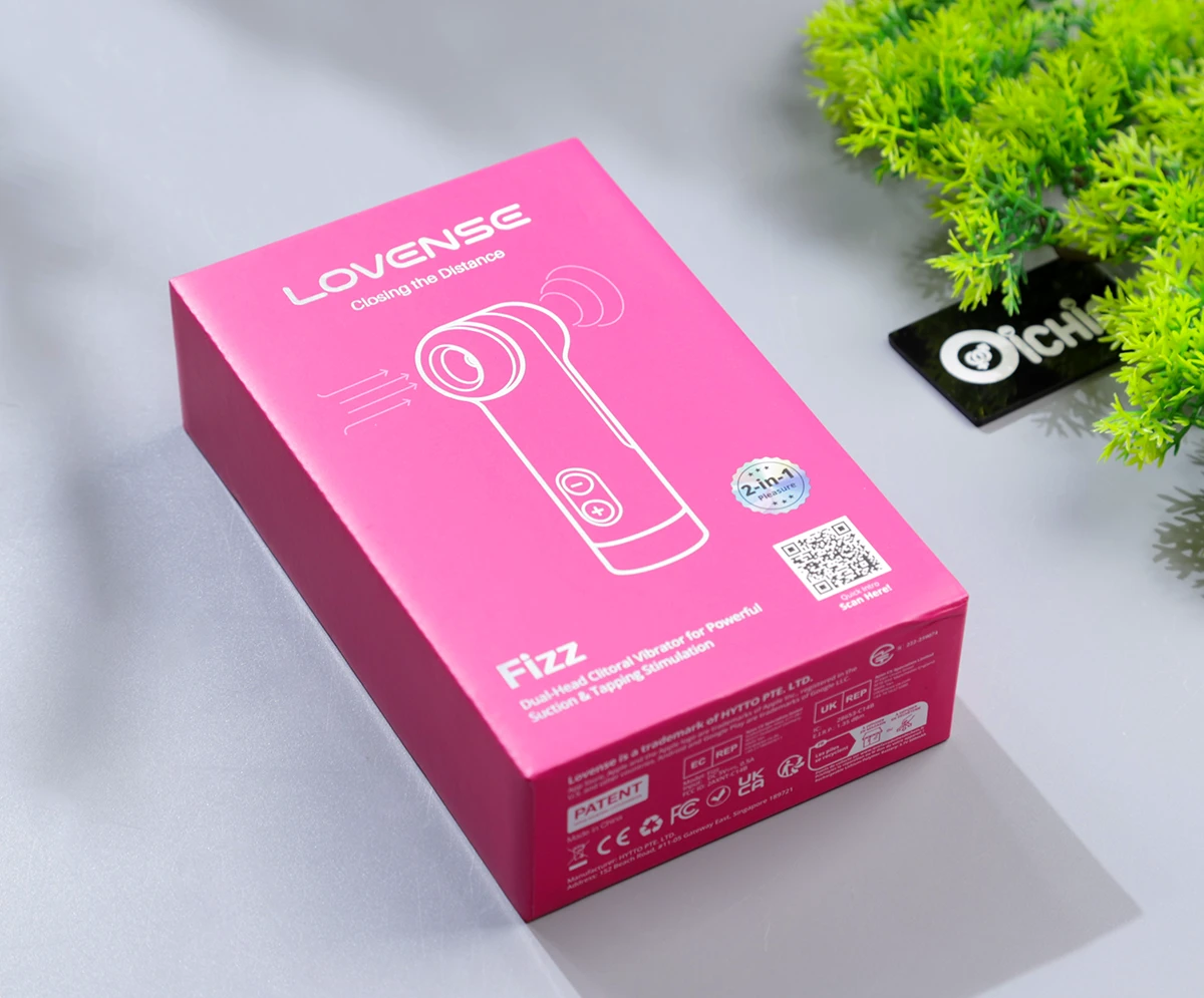 Hộp đóng gói Lovense Fizz màu hồng neon với thiết kế hiện đại